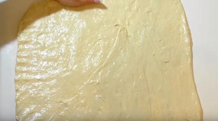 stretch each half of the dough with a square.