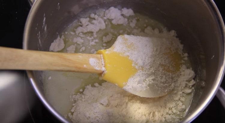 Add flour to the oil, mix.