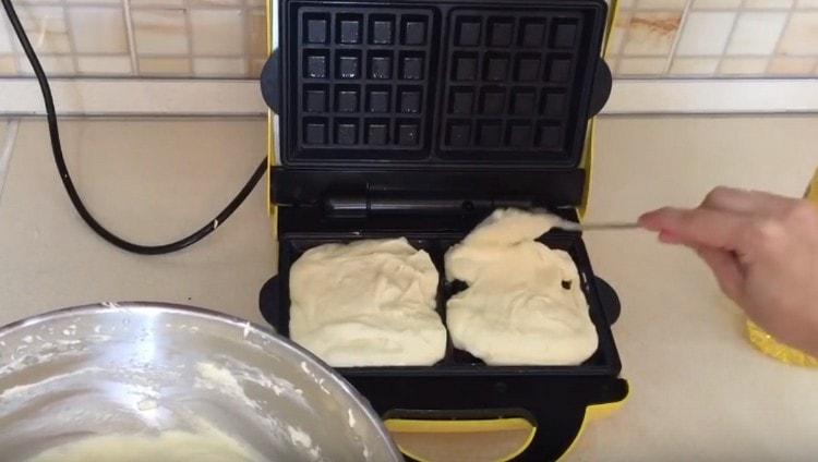 We spread the dough into a mold.