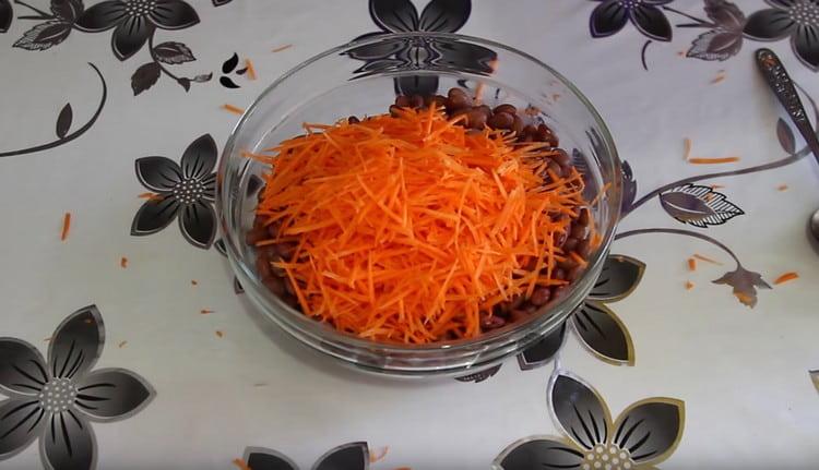 Add the grated carrot to the beans.