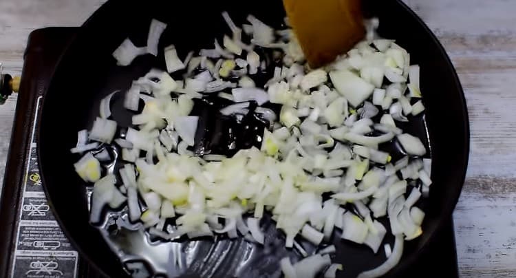 Fry onions in vegetable oil.