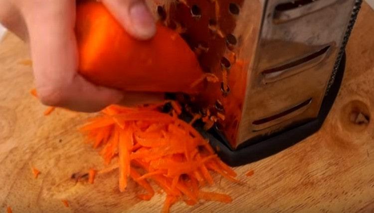 Grate carrots.