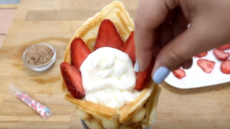 Decorate dessert with strawberry slices.