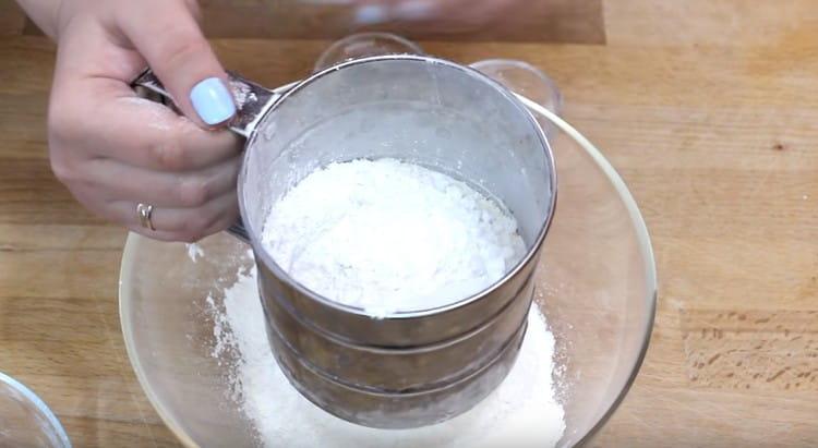 Sift dry ingredients into a bowl.