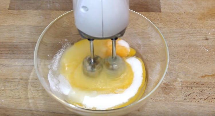 Beat eggs with sugar separately.