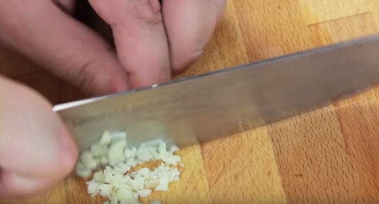 Grind the garlic and also add to the squash dough.