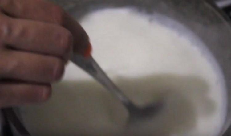 In a saucepan, bring the milk to a boil.