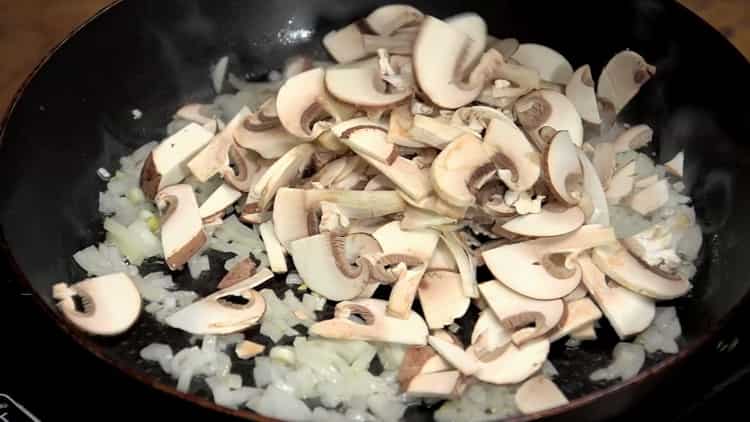 To cook, fry the mushrooms