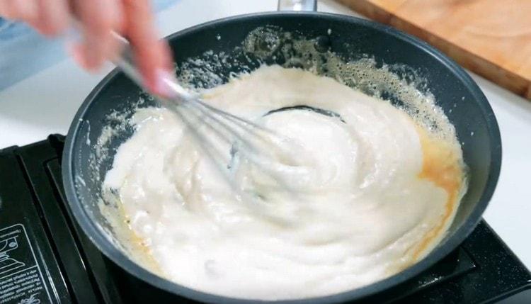 Add cream to the pan, mix.