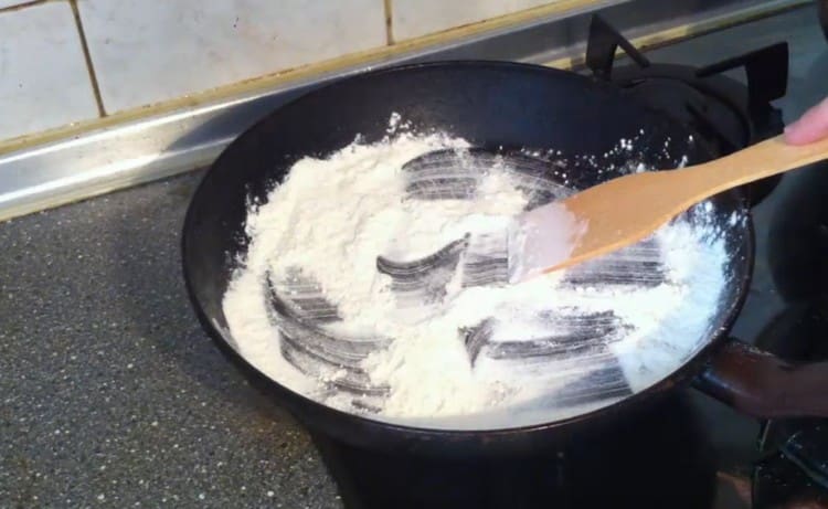 fry the flour in a dry pan.