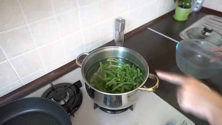 Boil water to prepare the beans.