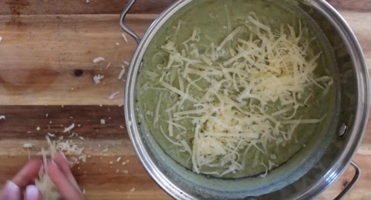 Add the grated cheese to the soup as well.