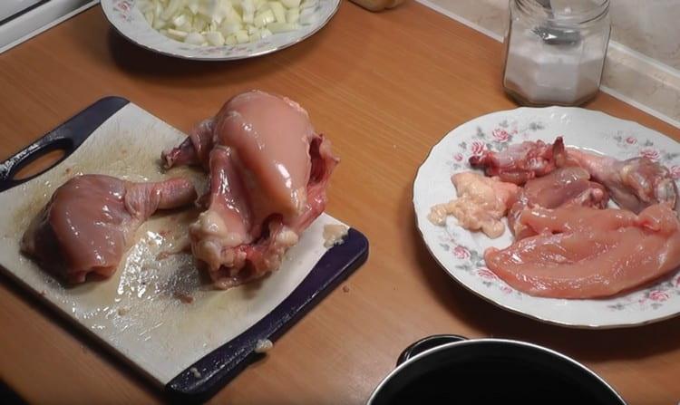 We cut the chicken into pieces.