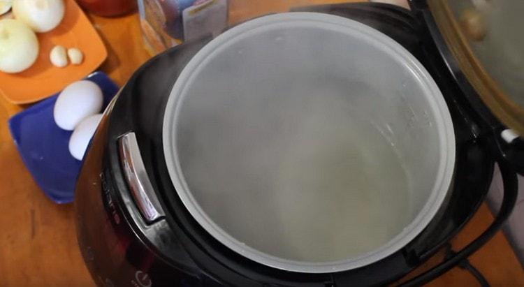 We boil water in a slow cooker.