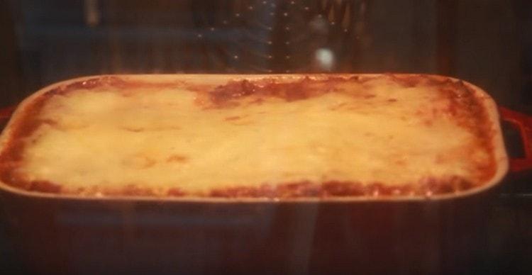 We send our lasagna to bake in the oven.