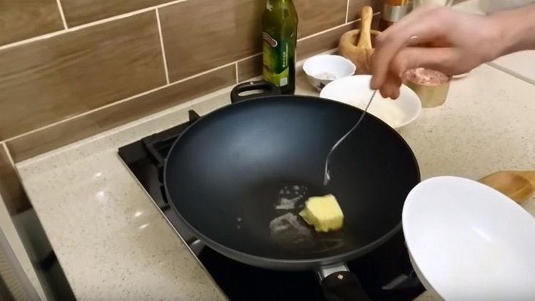 Melt a piece of butter in a pan,