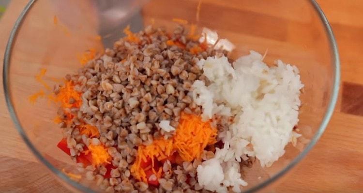 Add buckwheat and rice to the chopped vegetables.