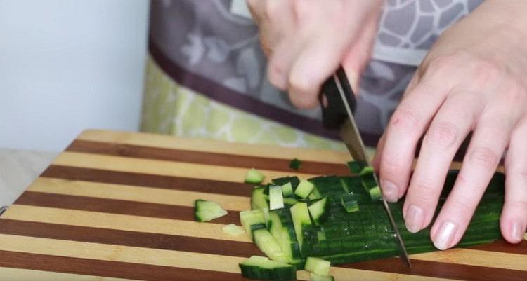Next, cut the cucumbers.