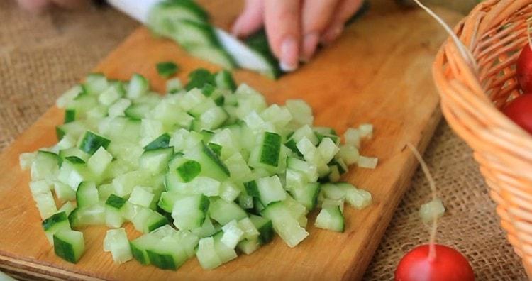 Fresh cucumbers are also diced.