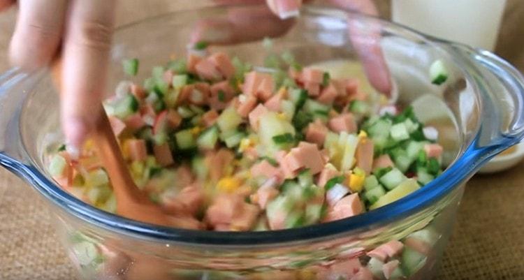 Combine all chopped ingredients in a large container and mix.