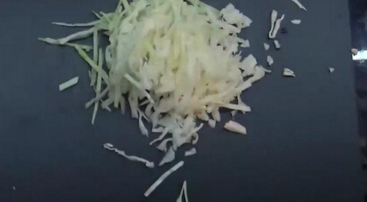 Finely chop the cabbage.