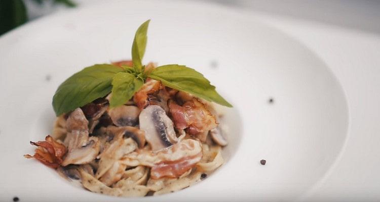 When serving, the dish can be decorated with basil.