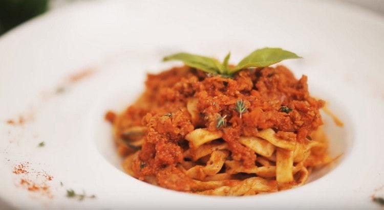 Fettuccine with bolognese sauce ready to be served.