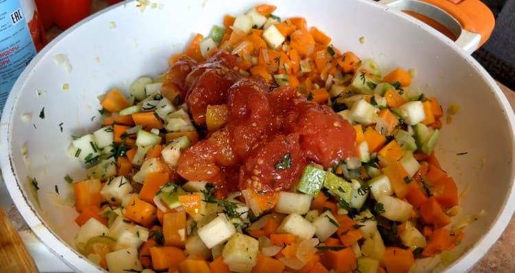 Next, add chopped tomatoes in your own juice.