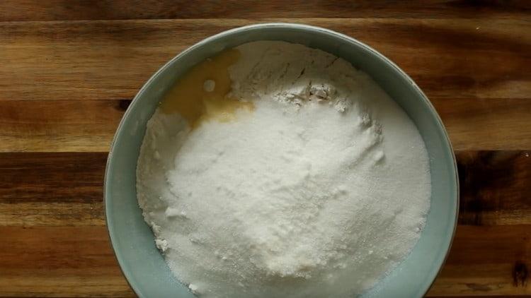 To the flour add softened butter, sugar, baking powder.