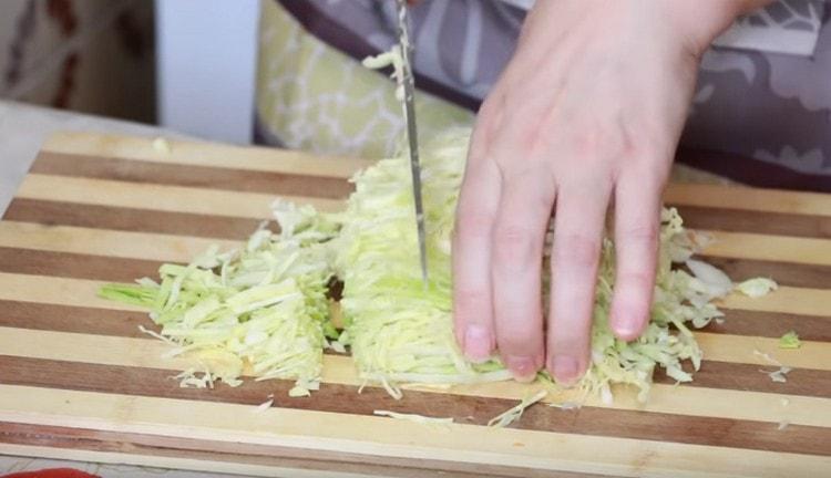 Shred the cabbage.