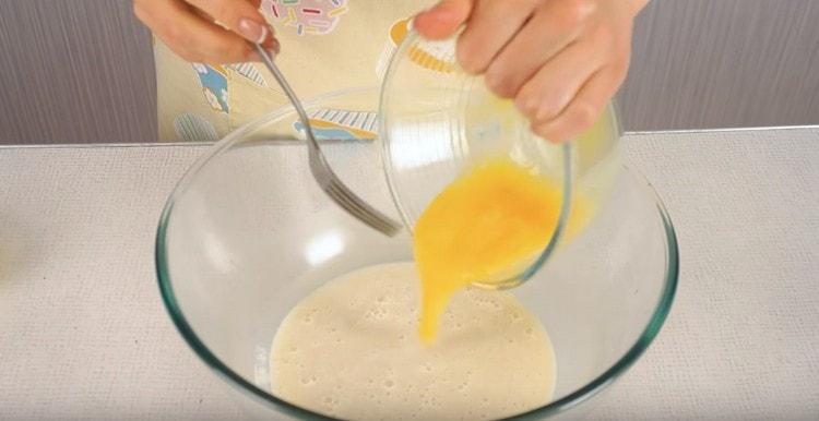 Beat the egg separately and pour it into a dough.