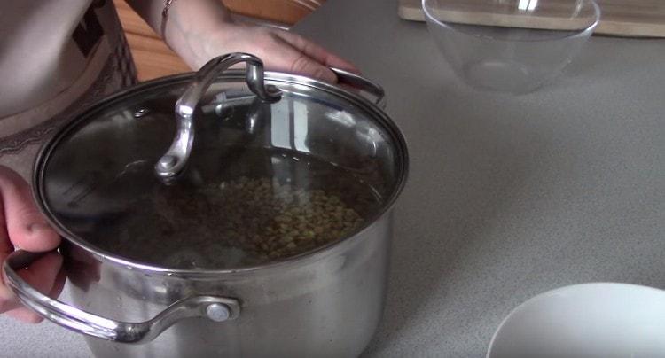 Fill the lentils with water and set to cook.