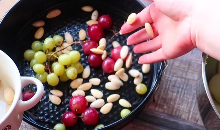 Add nuts to the grapes.