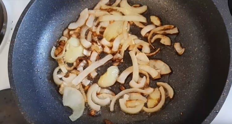 Fry the onion until golden brown.