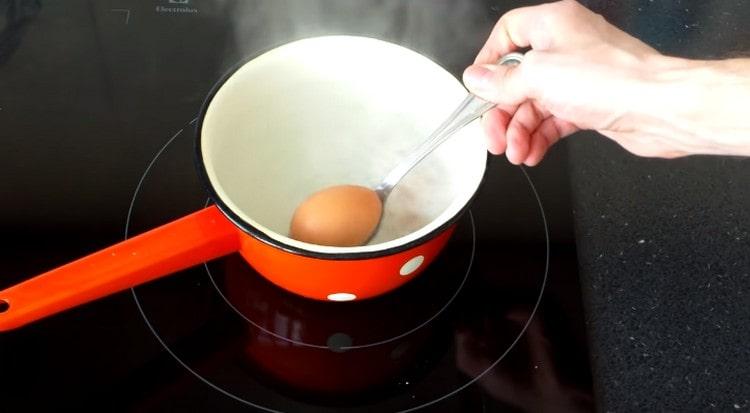 Cook hard-boiled egg.