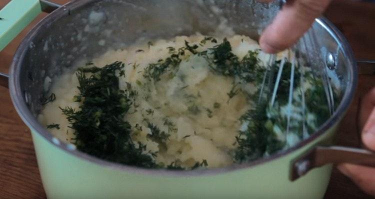 Add dill to mashed potatoes and mix.