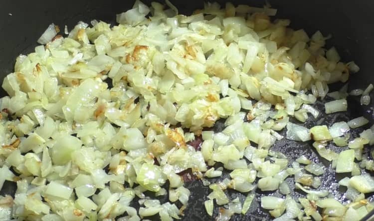 Grind the onion and fry it in a pan.