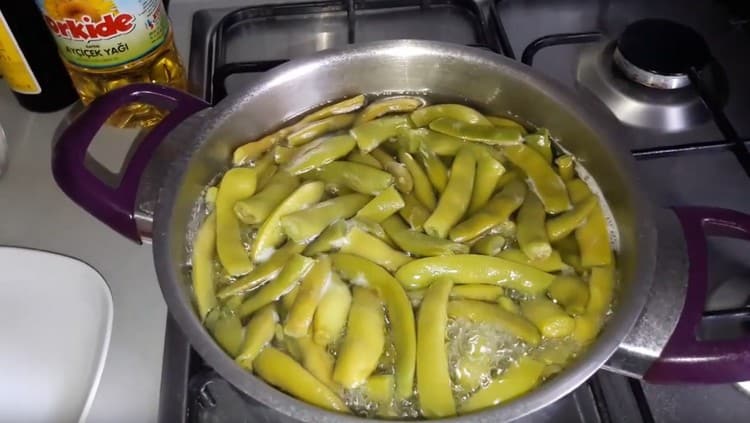 First, boil green beans.