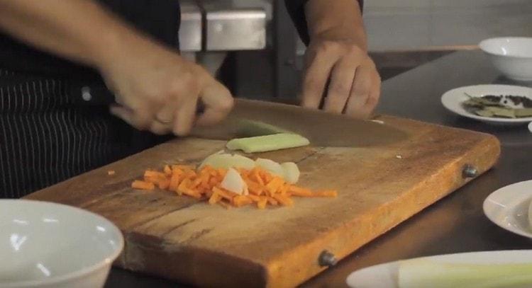 We also cut onions in half rings, and then celery.