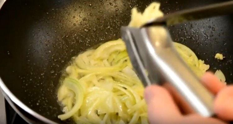 Squeeze the garlic into the pan.