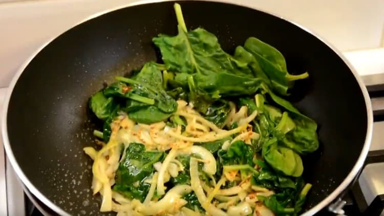 Add the spinach to the pan.
