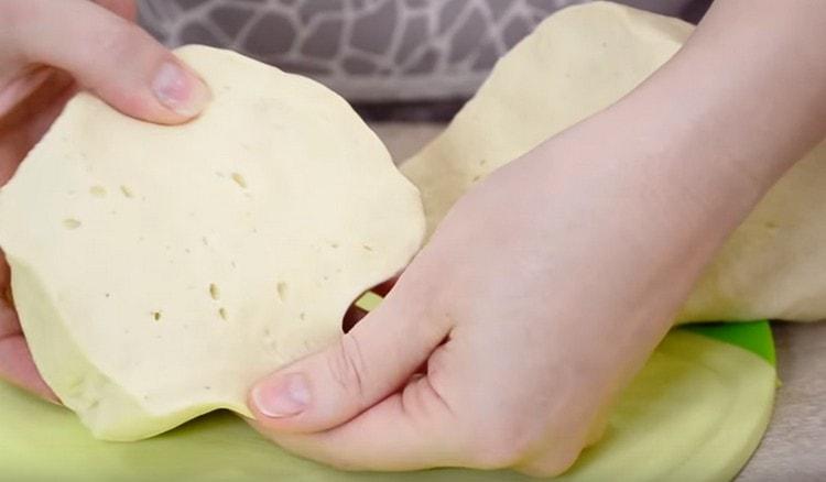 Divide the dough into portioned pieces.