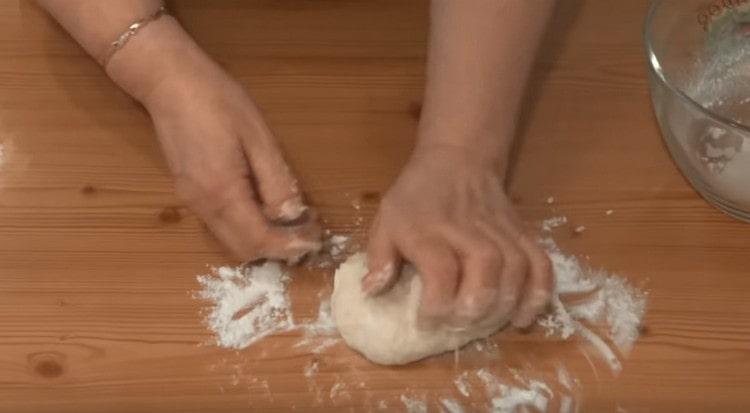 Knead the dough on a work surface.