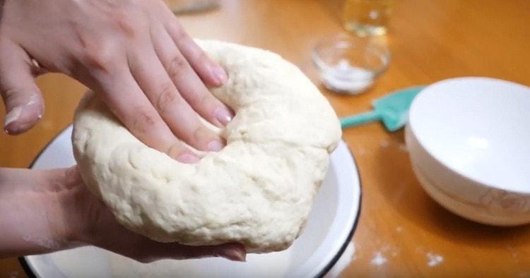 Knead soft elastic dough.