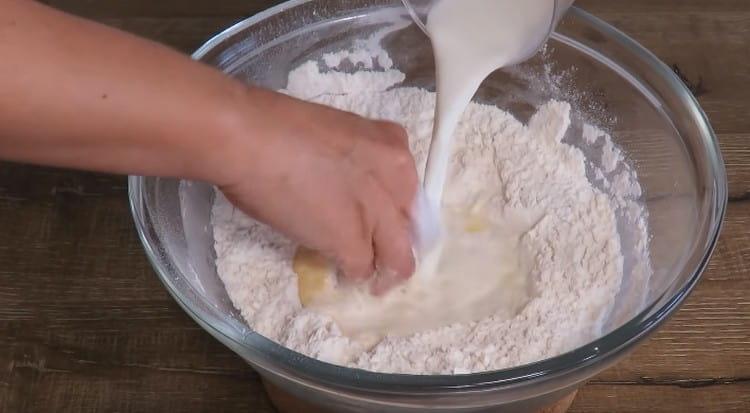 Add the egg and milk to the flour.