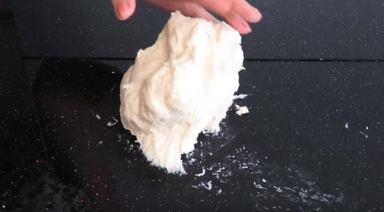 Knead the dough, first it will be sticky.