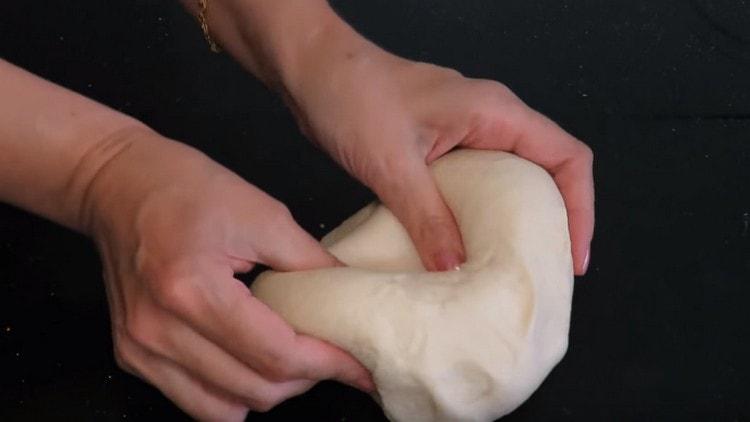 The dough should turn out elastic, no longer stick to your hands.