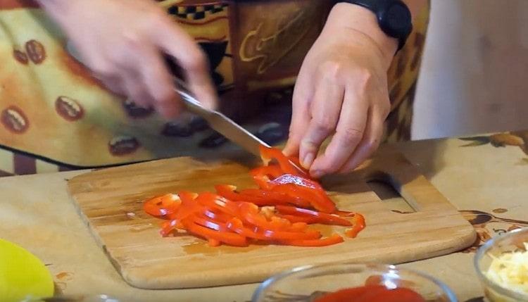 Chop the bell pepper into strips.