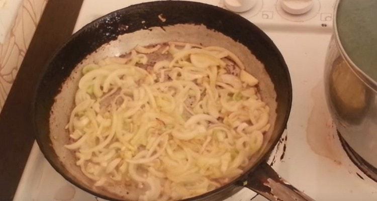 fry the onion in a pan until golden brown.