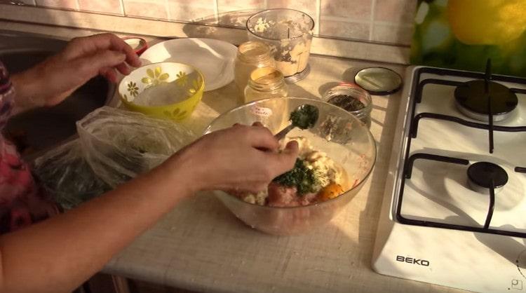 Add chopped onions and bread, spices to the minced meat.